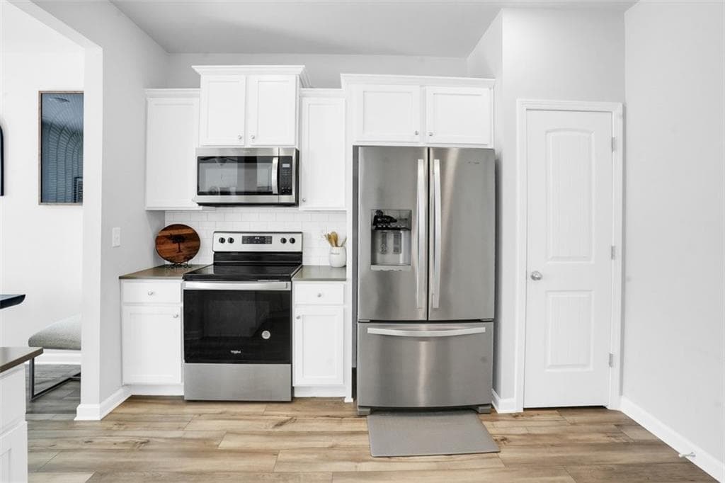 4 bedroom, 3 bathroom, 1,770 sq ft single family residence for sale at 4730 Kyle Terrace, Atlanta, GA 30349 — photo 8