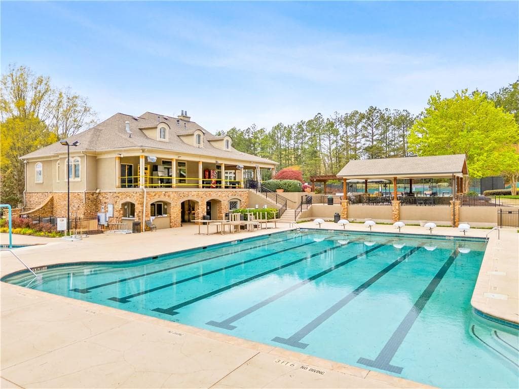 6 bedroom, 7 bathroom, 7,336 sq ft single family residence for sale at 8960 Merion Drive, Duluth, GA 30097 — photo 7