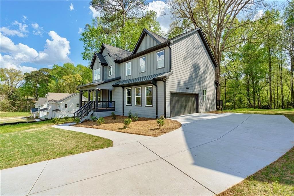 6 bedroom, 5 bathroom, 3,980 sq ft single family residence for sale at 1697 Eastside Parc Street, Atlanta, GA 30316 — photo 2
