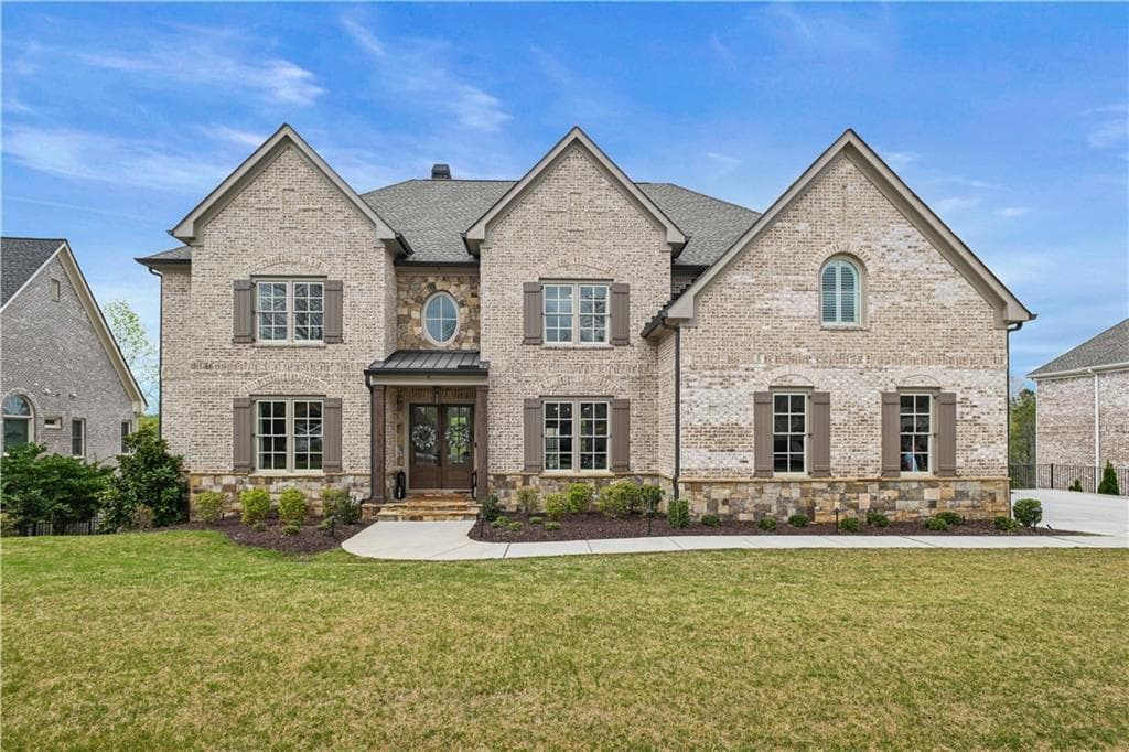 6 bedroom, 7 bathroom, 6,872 sq ft single family residence for sale at 3170 Glastonbury Lane, Suwanee, GA 30024 — photo 2