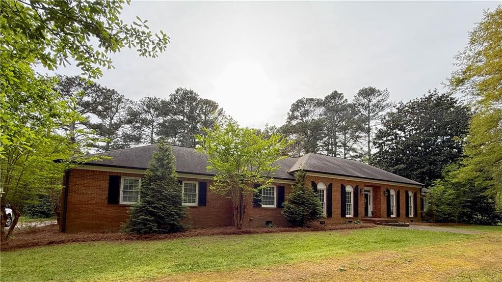 5 bedroom, 3 bathroom, 3,614 sq ft single family residence for sale at 945 Poplar Street, Monroe, GA 30655
