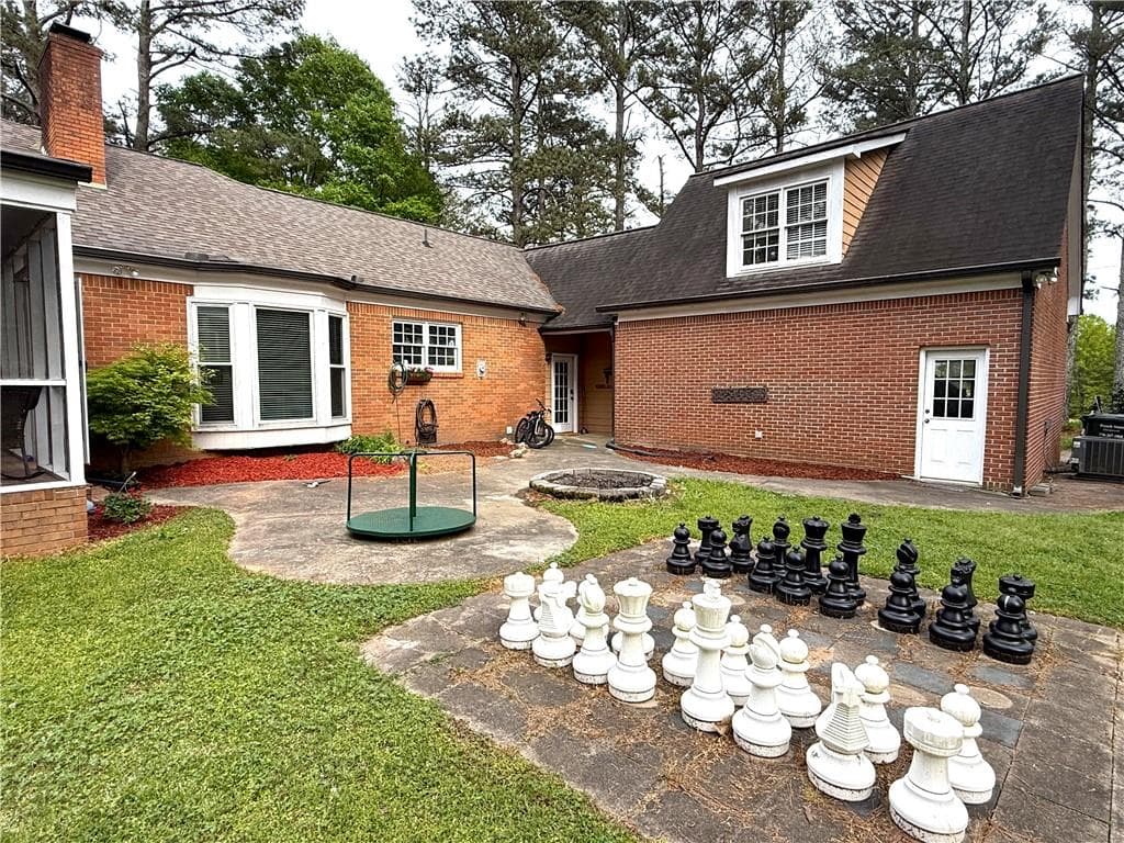 5 bedroom, 3 bathroom, 3,614 sq ft single family residence for sale at 945 Poplar Street, Monroe, GA 30655 — photo 4