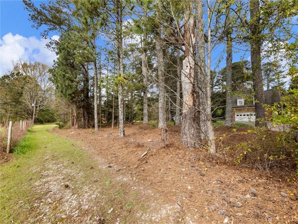 5 bedroom, 3 bathroom, 3,614 sq ft single family residence for sale at 945 Poplar Street, Monroe, GA 30655 — photo 7