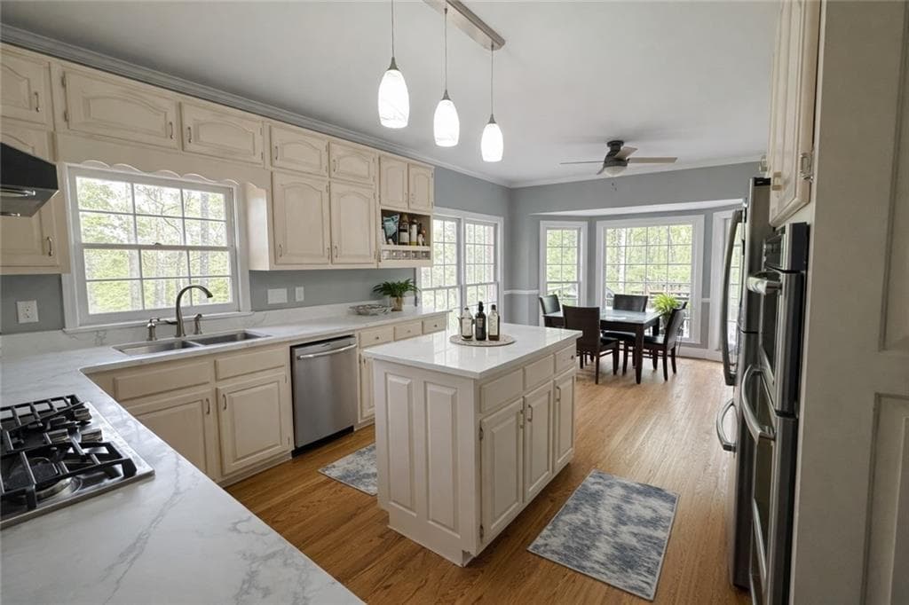 5 bedroom, 4 bathroom, 4,478 sq ft single family residence for sale at 4480 Moorings Lane, Snellville, GA 30039 — photo 7