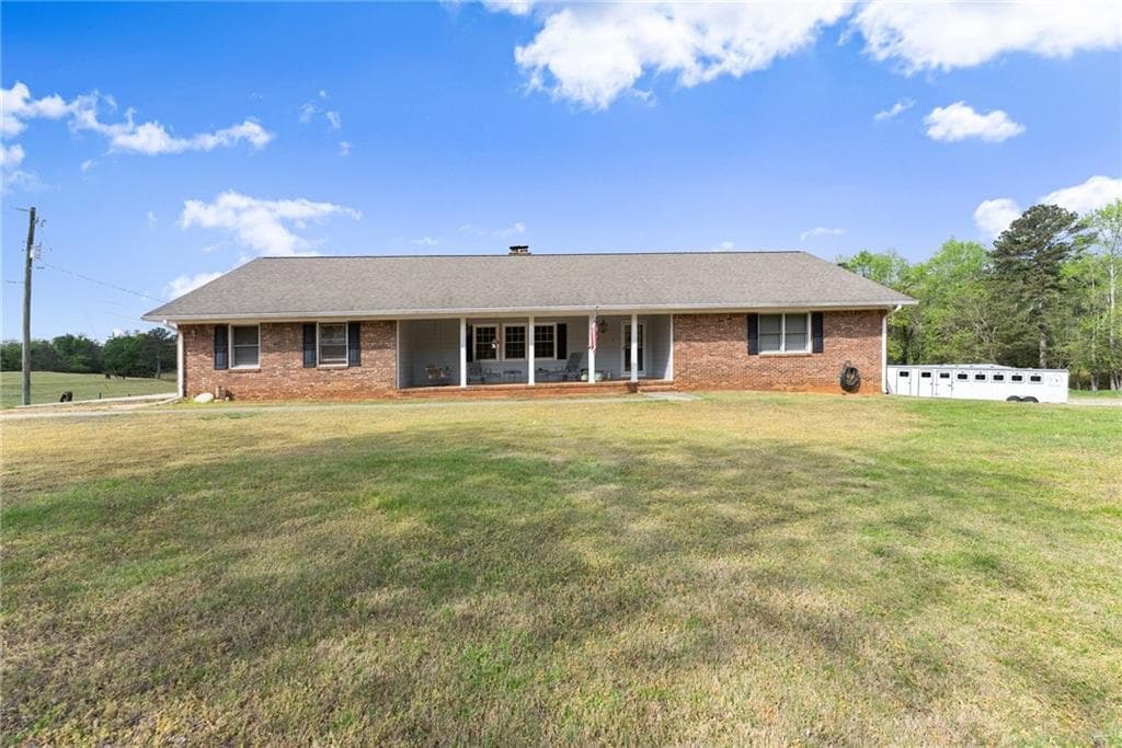 4 bedroom, 3 bathroom, 1,832 sq ft single family residence for sale at 2200 Highway 81, Loganville, GA 30052 — photo 3