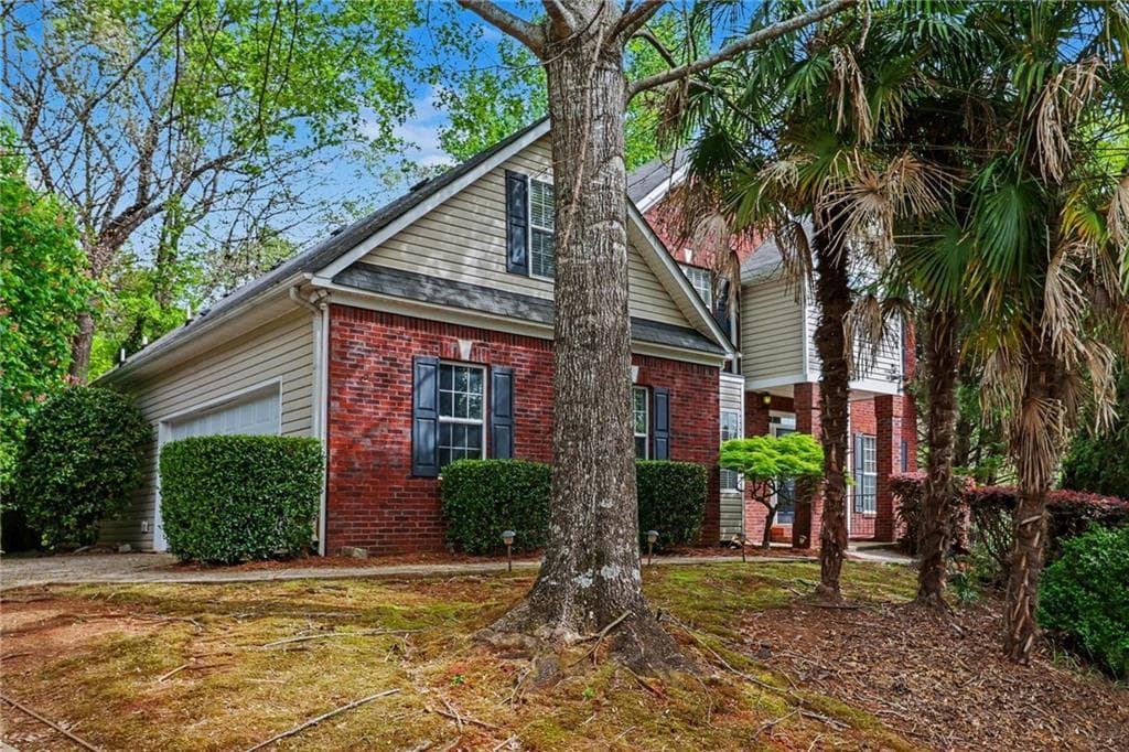 5 bedroom, 4 bathroom, 3,888 sq ft single family residence for sale at 3055 Heatherstone Drive, Cumming, GA 30041 — photo 2
