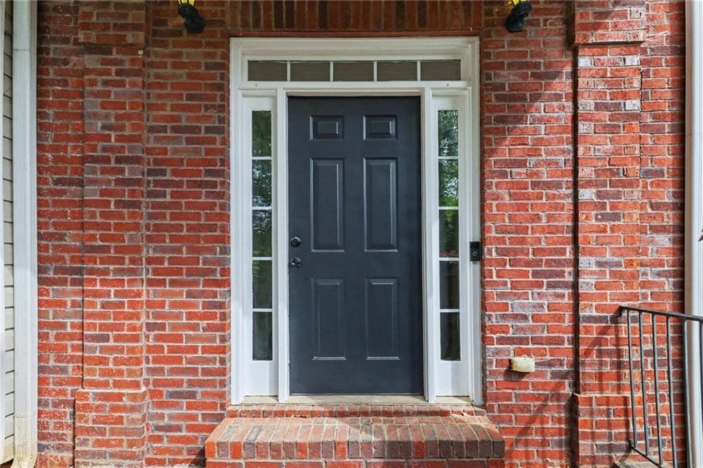 5 bedroom, 4 bathroom, 3,888 sq ft single family residence for sale at 3055 Heatherstone Drive, Cumming, GA 30041 — photo 3