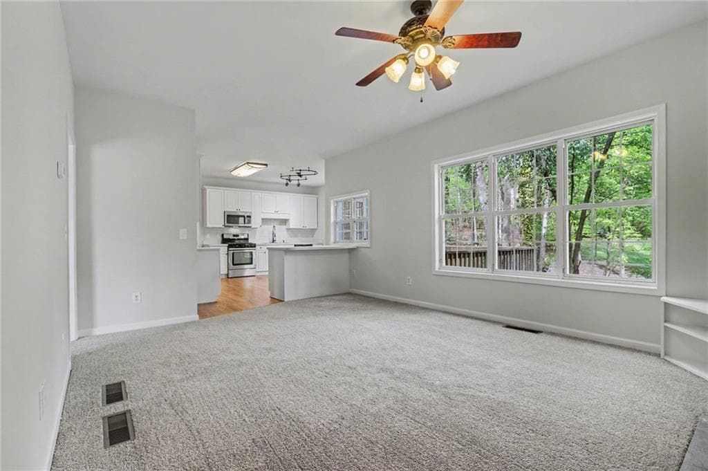 5 bedroom, 4 bathroom, 3,888 sq ft single family residence for sale at 3055 Heatherstone Drive, Cumming, GA 30041 — photo 7