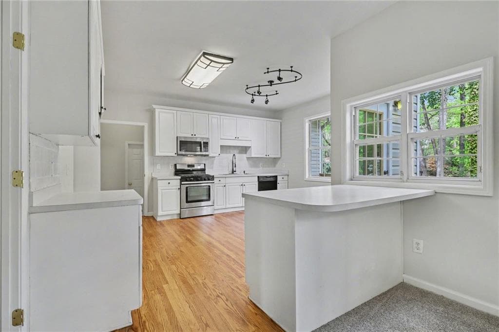 5 bedroom, 4 bathroom, 3,888 sq ft single family residence for sale at 3055 Heatherstone Drive, Cumming, GA 30041 — photo 9