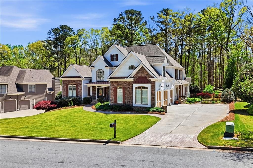 6 bedroom, 5 bathroom, 4,859 sq ft single family residence for sale at 4147 Gold Mill Ridge, Canton, GA 30114 — photo 2