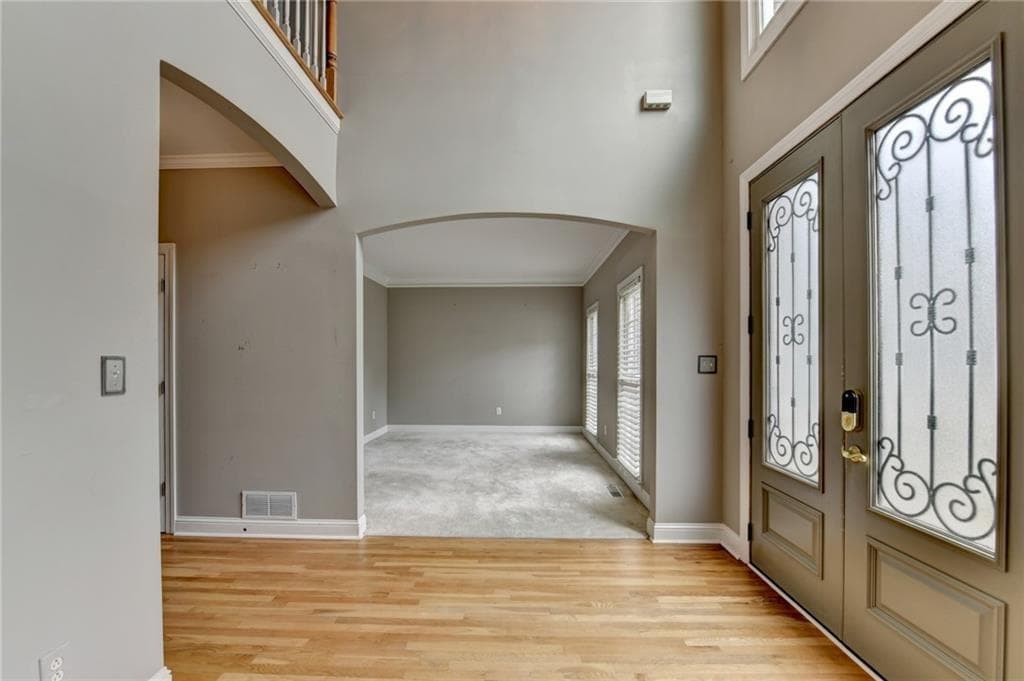 6 bedroom, 5 bathroom, 2,943 sq ft single family residence for sale at 1015 Rowe Oak Circle, Lawrenceville, GA 30043 — photo 3