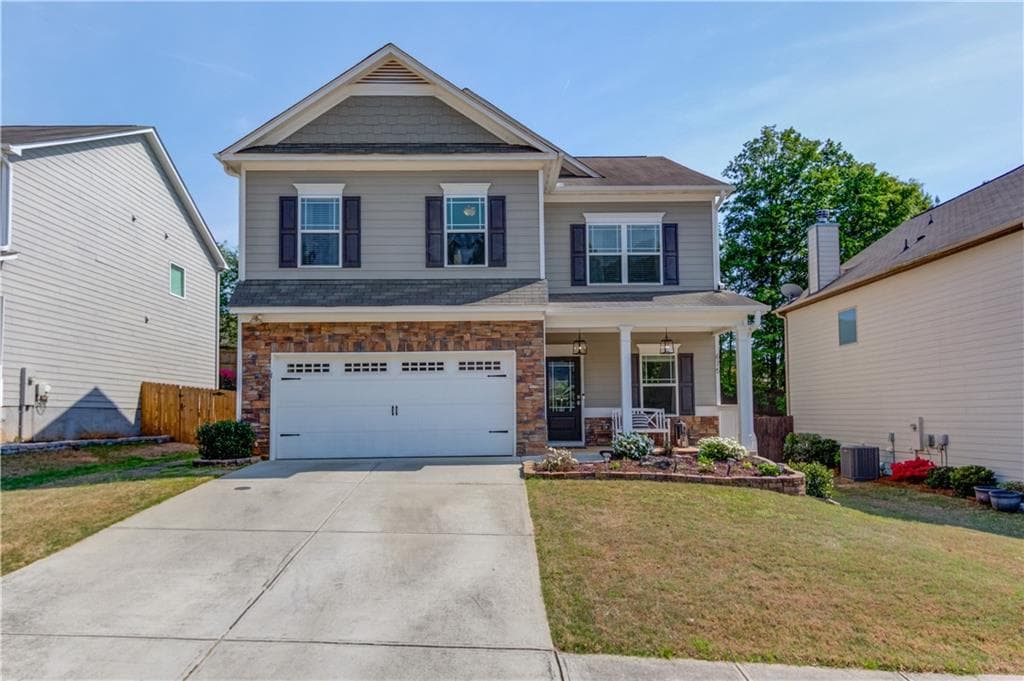 4 bedroom, 3 bathroom, 2,600 sq ft single family residence sold at 675 Country Ridge Drive, Hoschton, GA 30548