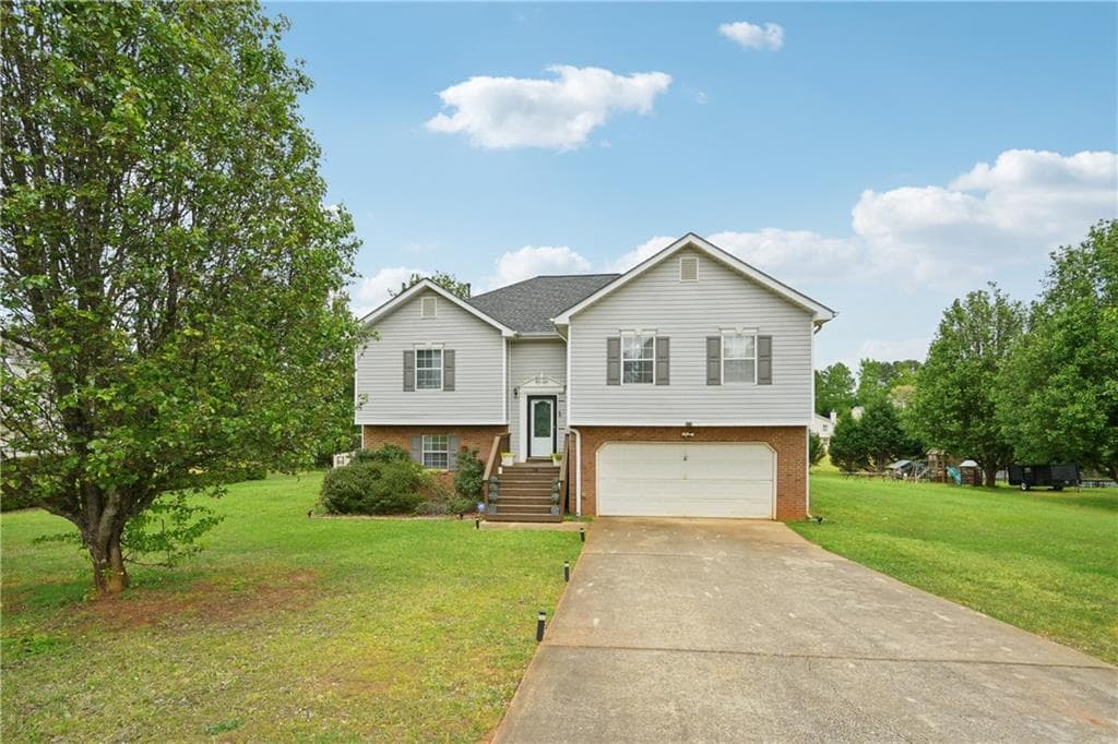 4 bedroom, 3 bathroom, 2,839 sq ft single family residence for sale at 224 Solomon Drive, Ellenwood, GA 30294 — photo 2