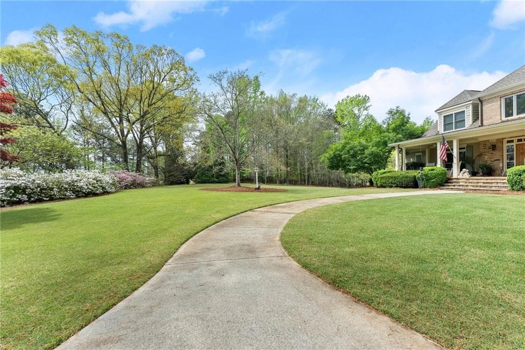 5 bedroom, 5 bathroom, 6,450 sq ft single family residence for sale at 594 Peachtree Road, Hoschton, GA 30548 — photo 8