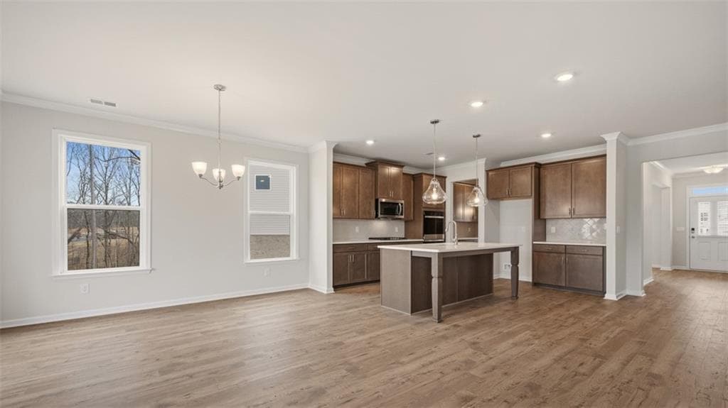 4 bedroom, 5 bathroom, 3,110 sq ft single family residence for sale at 1780 Goodwin Circle, Hampton, GA 30228 — photo 8