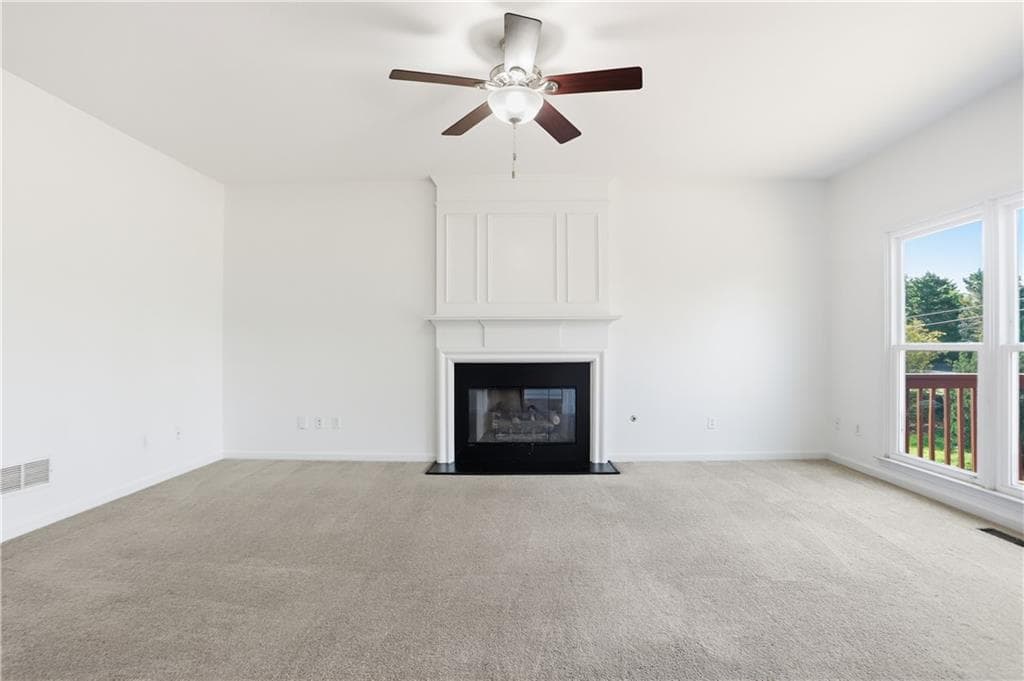 4 bedroom, 3 bathroom, 3,476 sq ft single family residence for sale at 7770 Llangollen Way, Cumming, GA 30041 — photo 3