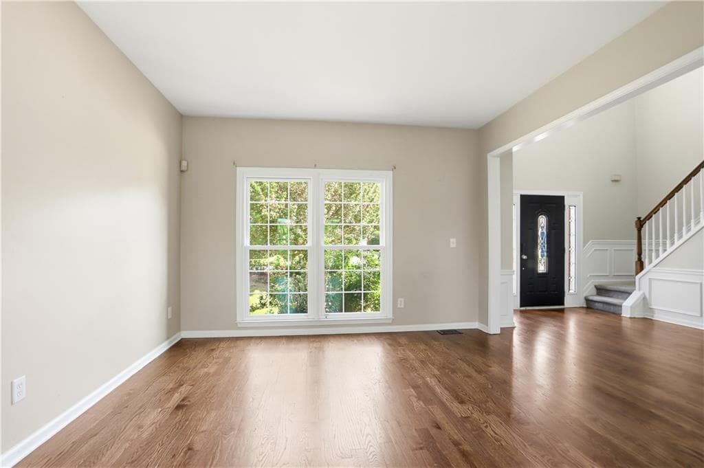 4 bedroom, 3 bathroom, 3,476 sq ft single family residence for sale at 7770 Llangollen Way, Cumming, GA 30041 — photo 7