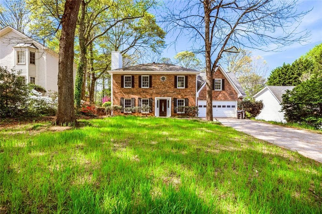 4 bedroom, 3 bathroom, 2,250 sq ft single family residence for sale at 4085 Vicksburg Drive, Lawrenceville, GA 30044 — photo 2