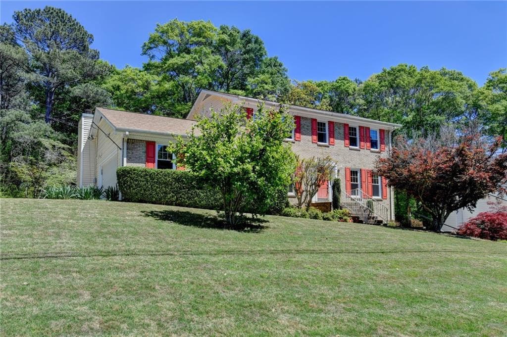 4 bedroom, 3 bathroom, 2,348 sq ft single family residence sold at 2196 Lunceford Lane, Lilburn, GA 30047