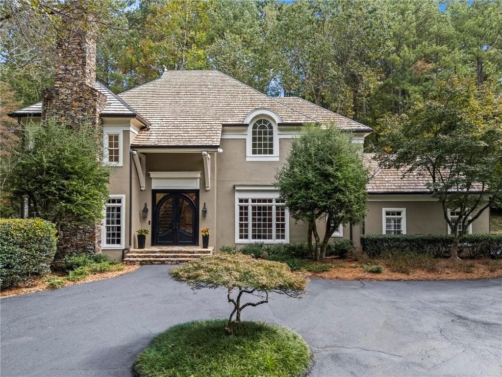 5 bedroom, 7 bathroom, 6,600 sq ft single family residence for sale at 1235 W Garmon Road, Sandy Springs, GA 30327 — photo 2