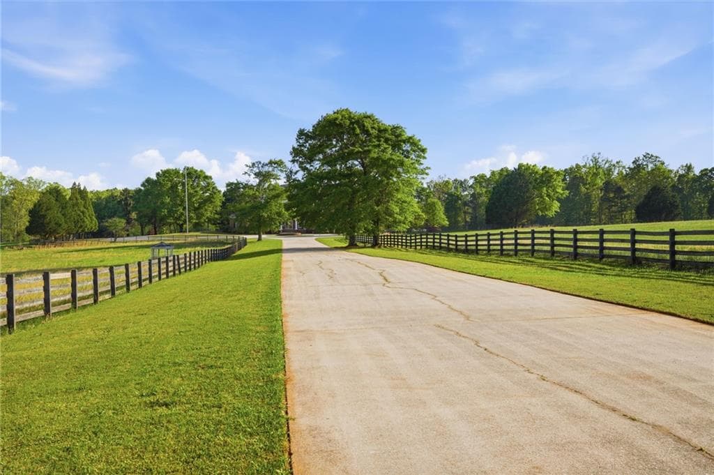 5 bedroom, 4 bathroom, 6,664 sq ft single family residence for sale at 1202 Hodges Circle, Mansfield, GA 30055 — photo 9