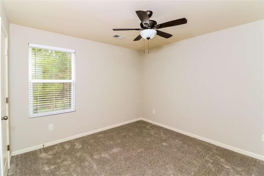 3 bedroom, 3 bathroom, 1,997 sq ft single family residence for sale at 7103 Tanger Boulevard, Riverdale, GA 30296 — photo 3