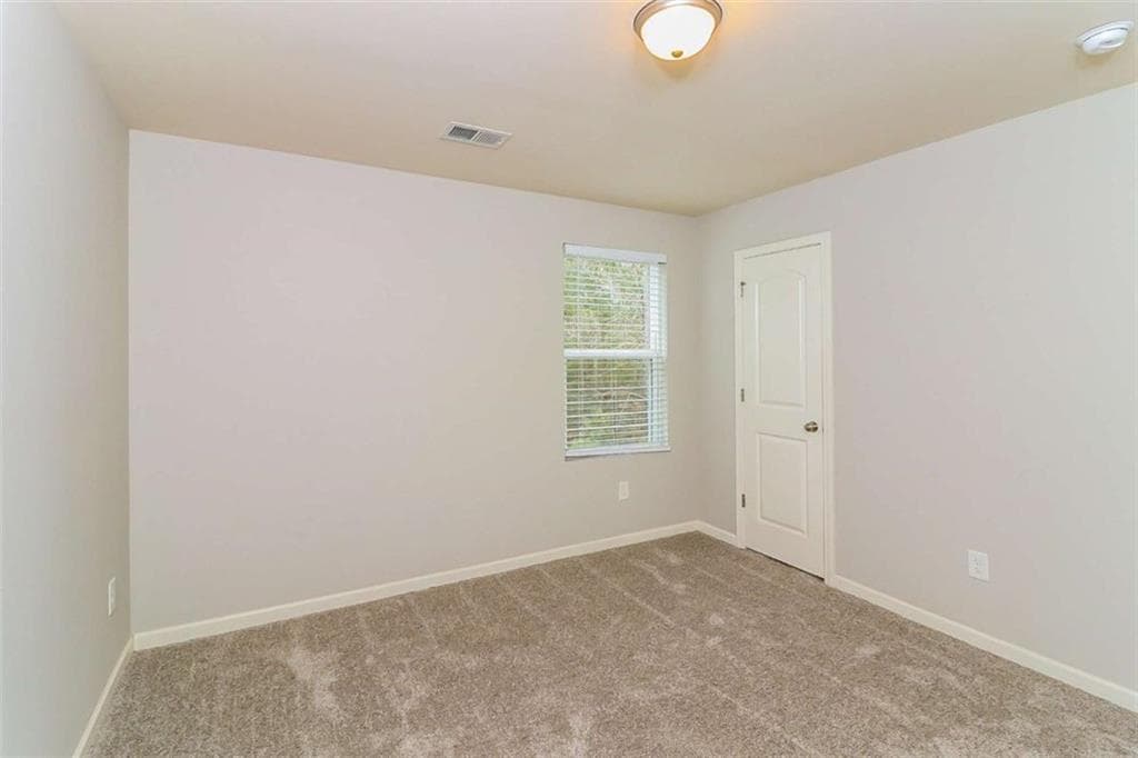 3 bedroom, 3 bathroom, 1,997 sq ft single family residence for sale at 7103 Tanger Boulevard, Riverdale, GA 30296 — photo 4