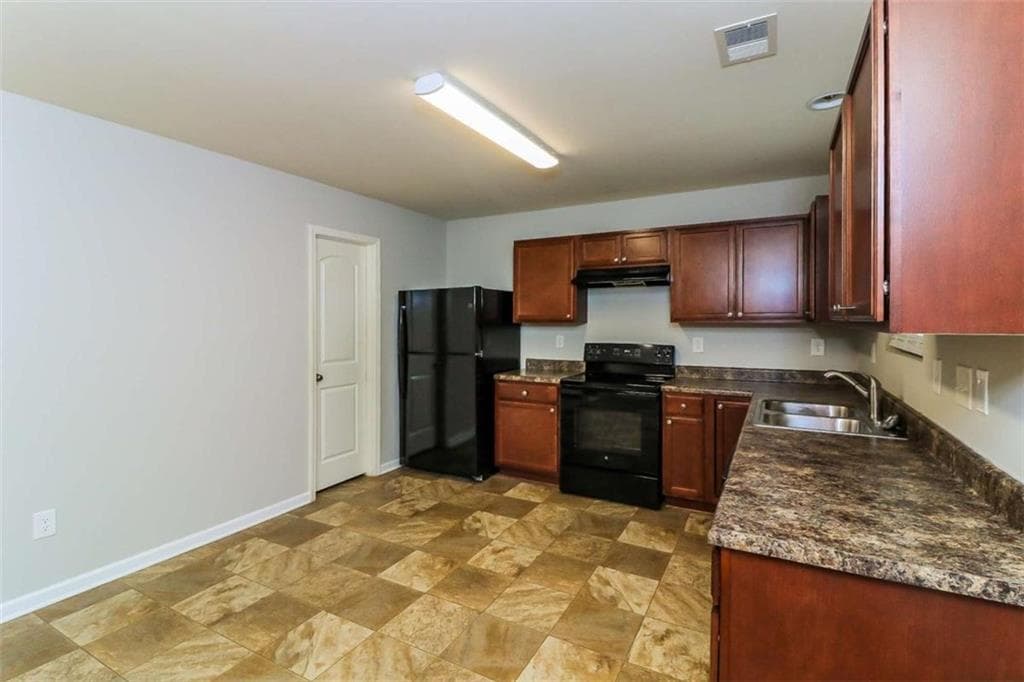 3 bedroom, 3 bathroom, 1,997 sq ft single family residence for sale at 7103 Tanger Boulevard, Riverdale, GA 30296 — photo 10