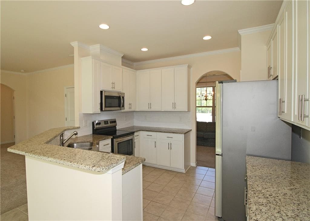 5 bedroom, 3 bathroom, 2,594 sq ft single family residence for sale at 6568 Panasa Court, Tucker, GA 30084 — photo 9