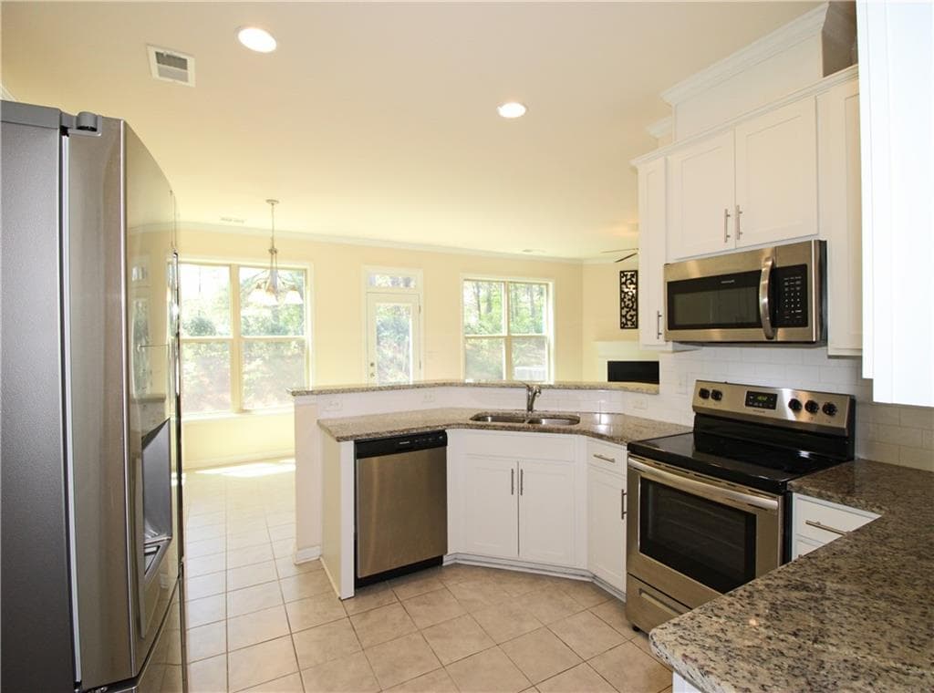 5 bedroom, 3 bathroom, 2,594 sq ft single family residence for sale at 6568 Panasa Court, Tucker, GA 30084 — photo 10