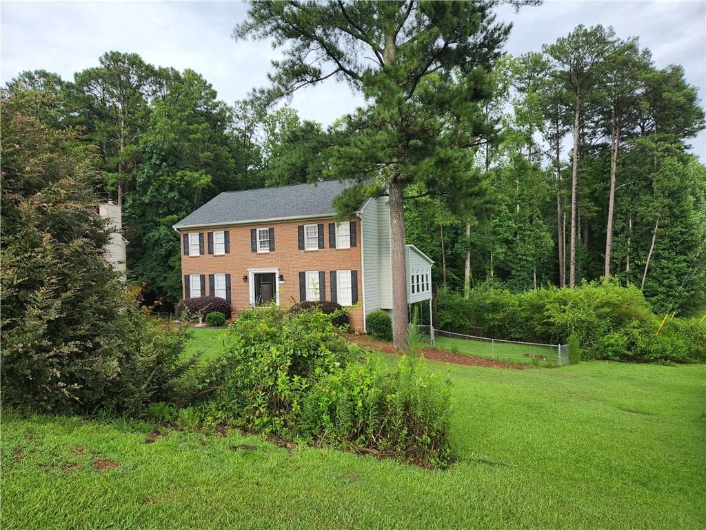 4 bedroom, 3 bathroom, 2,963 sq ft single family residence for sale at 4656 Chimney Rock Drive, Lilburn, GA 30047 — photo 1 of 27