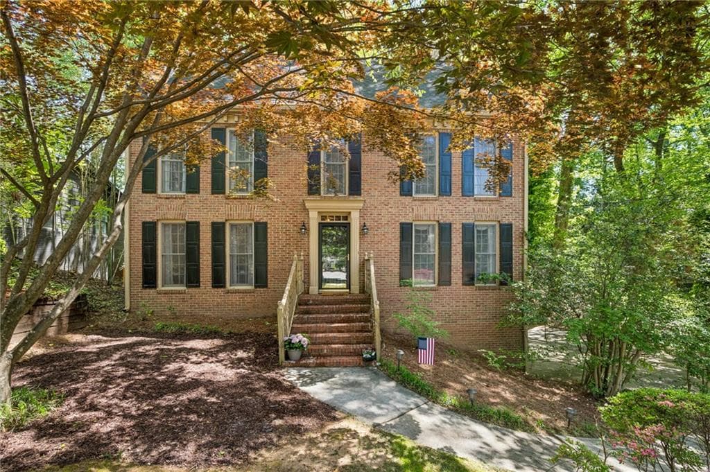 4 bedroom, 3 bathroom, 2,512 sq ft single family residence sold at 5895 Greenbrier Road, Atlanta, GA 30328