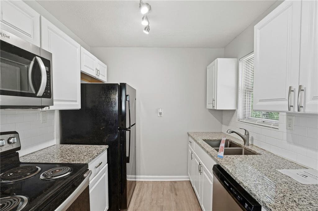 3 bedroom, 1 bathroom, 950 sq ft single family residence for sale at 5575 Oglesby Road, Atlanta, GA 30349 — photo 10