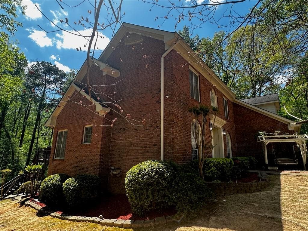 5 bedroom, 4 bathroom, 4,478 sq ft single family residence for sale at 4480 Moorings Lane, Snellville, GA 30039 — photo 2