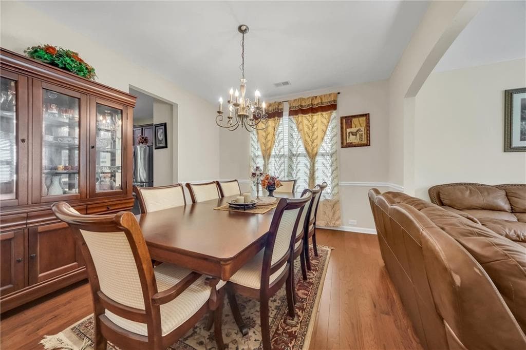 6 bedroom, 4 bathroom, 5,125 sq ft single family residence for sale at 5220 Breckinrigde Lane, Cumming, GA 30040 — photo 5