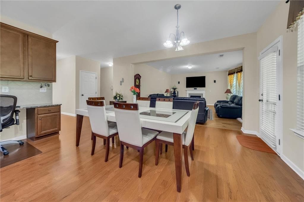 6 bedroom, 4 bathroom, 5,125 sq ft single family residence for sale at 5220 Breckinrigde Lane, Cumming, GA 30040 — photo 8