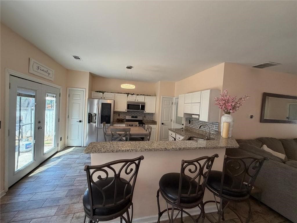 3 bedroom, 3 bathroom, 1,520 sq ft single family residence for sale at 11190 Wittenridge Drive, Alpharetta, GA 30022 — photo 8
