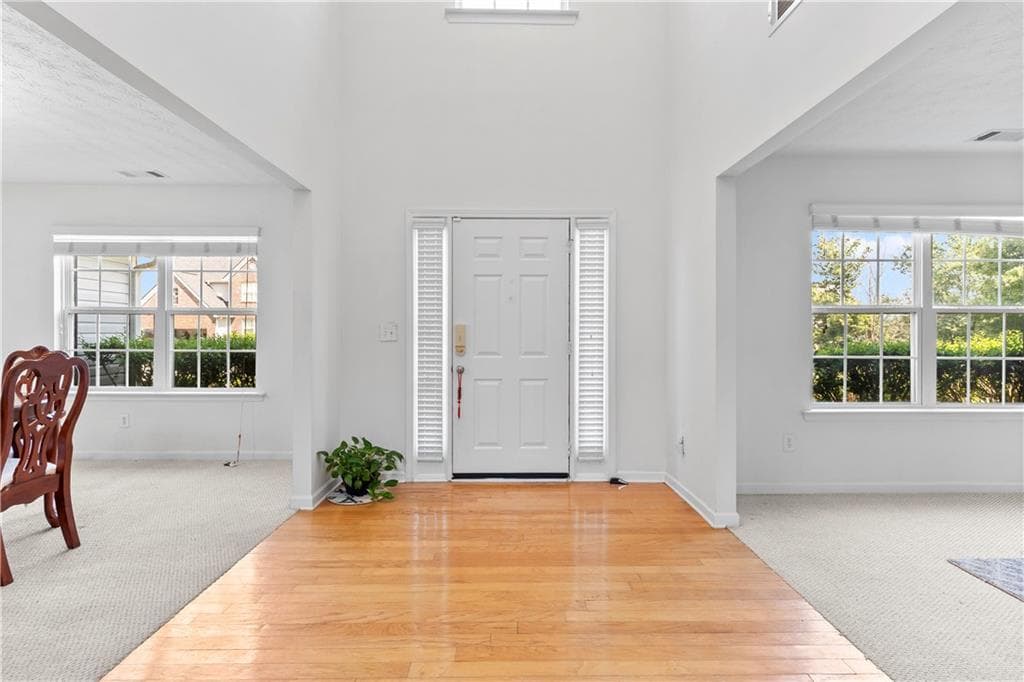 5 bedroom, 3 bathroom, 2,740 sq ft single family residence for sale at 665 Roxford Lane, Buford, GA 30518 — photo 2