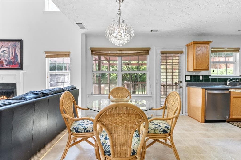 5 bedroom, 3 bathroom, 2,740 sq ft single family residence for sale at 665 Roxford Lane, Buford, GA 30518 — photo 4