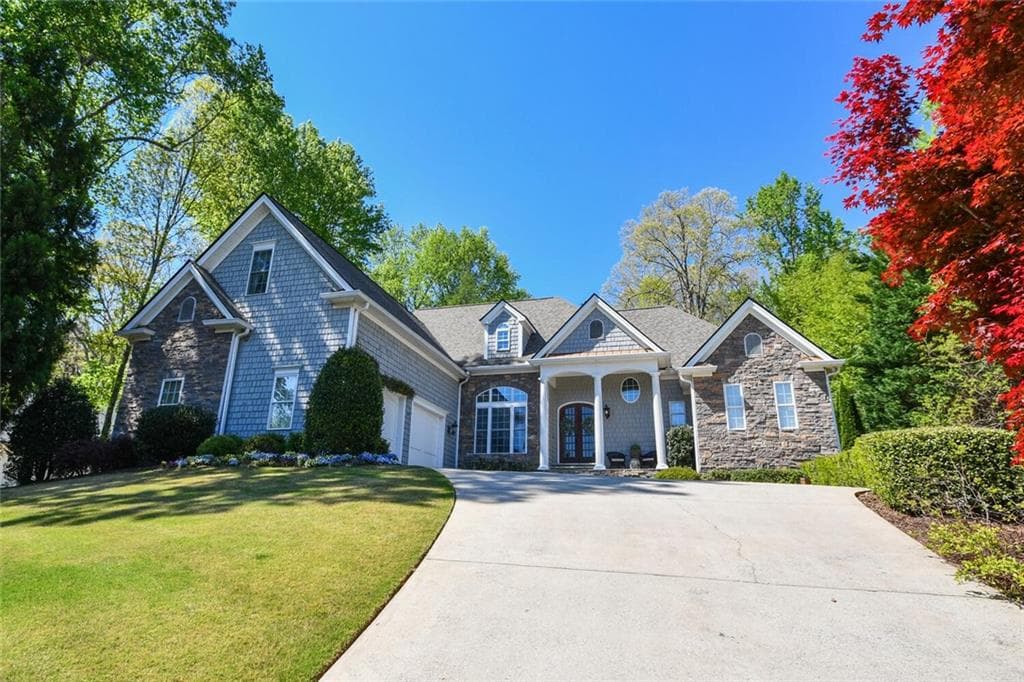 7 bedroom, 6 bathroom, 5,510 sq ft single family residence for sale at 3036 Hickory Hills Drive, Gainesville, GA 30506 — photo 2
