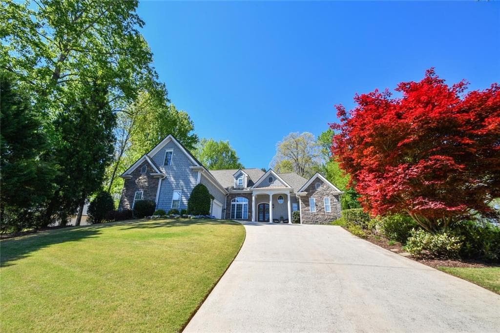 7 bedroom, 6 bathroom, 5,510 sq ft single family residence for sale at 3036 Hickory Hills Drive, Gainesville, GA 30506 — photo 3