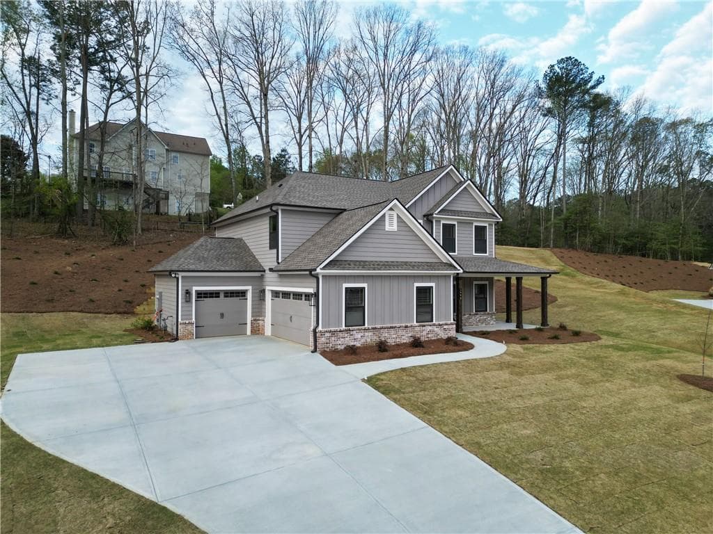 4 bedroom, 3 bathroom, 2,557 sq ft single family residence for sale at 1440 Cherry Bark Court, Loganville, GA 30052 — photo 2