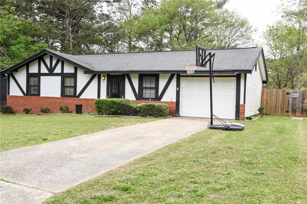 3 bedroom, 2 bathroom, 1,032 sq ft single family residence under contract at 8943 Gatewood Circle, Jonesboro, GA 30238 — photo 2