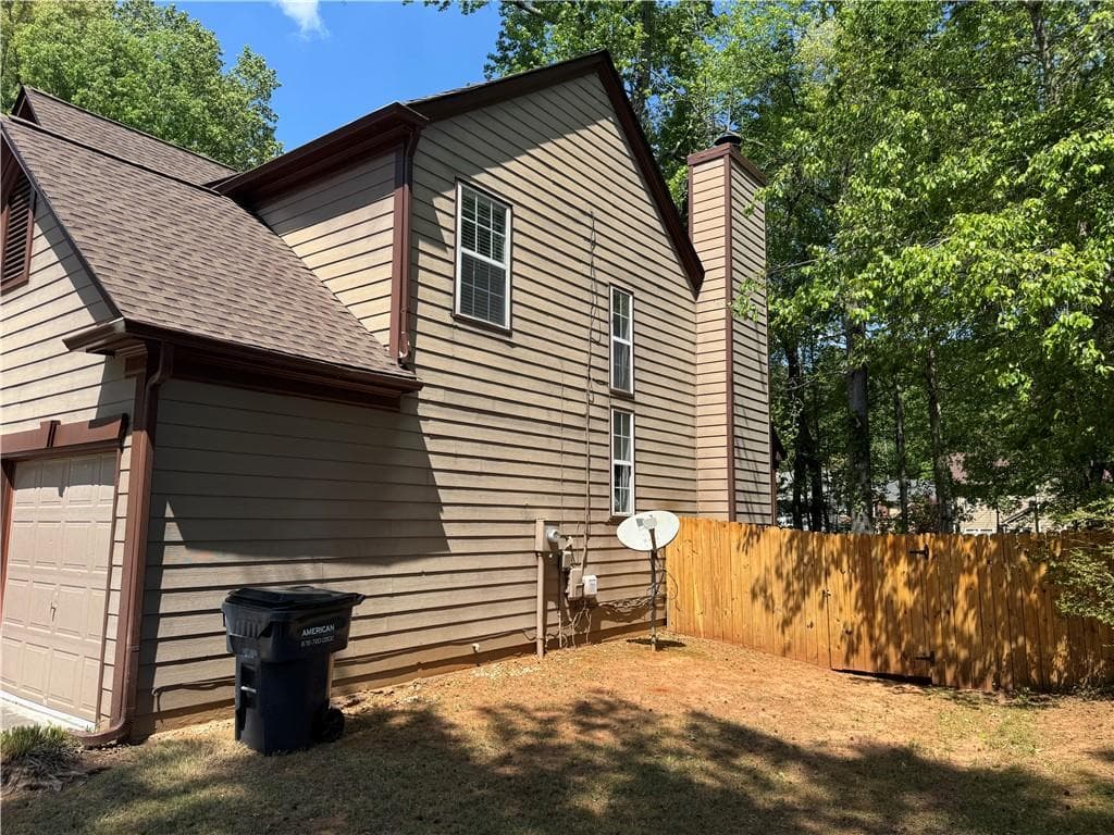 4 bedroom, 3 bathroom, 2,557 sq ft single family residence for sale at 2874 Donamire Lane, Kennesaw, GA 30144 — photo 2