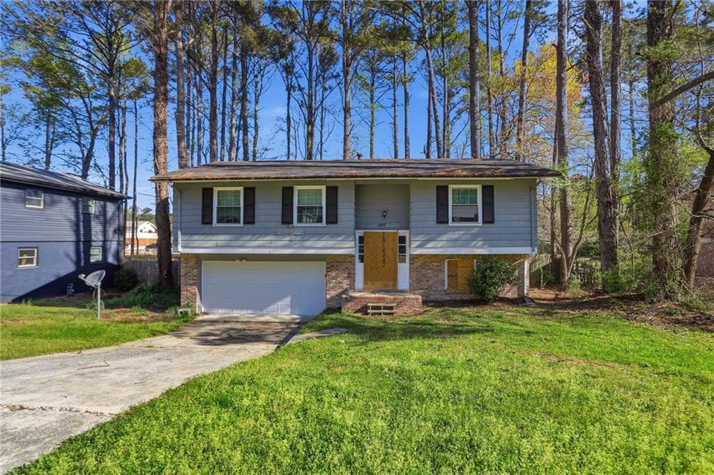 4 bedroom, 2 bathroom, 1,095 sq ft single family residence for sale at 6665 Hidden Brook Trail, Atlanta, GA 30349 — photo 1 of 6