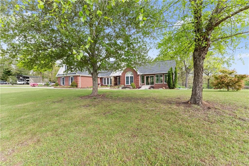 5 bedroom, 3 bathroom, 4,182 sq ft single family residence for sale at 4841 Cobb Griffin, Gillsville, GA 30543 — photo 7