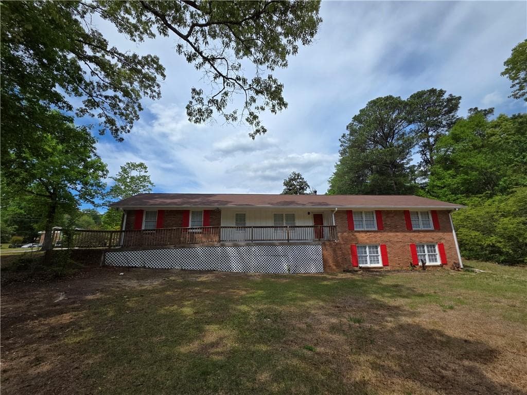 4 bedroom, 2 bathroom, 3,261 sq ft single family residence for sale at 7016 Skyline Drive, Lithia Springs, GA 30122 — photo 3