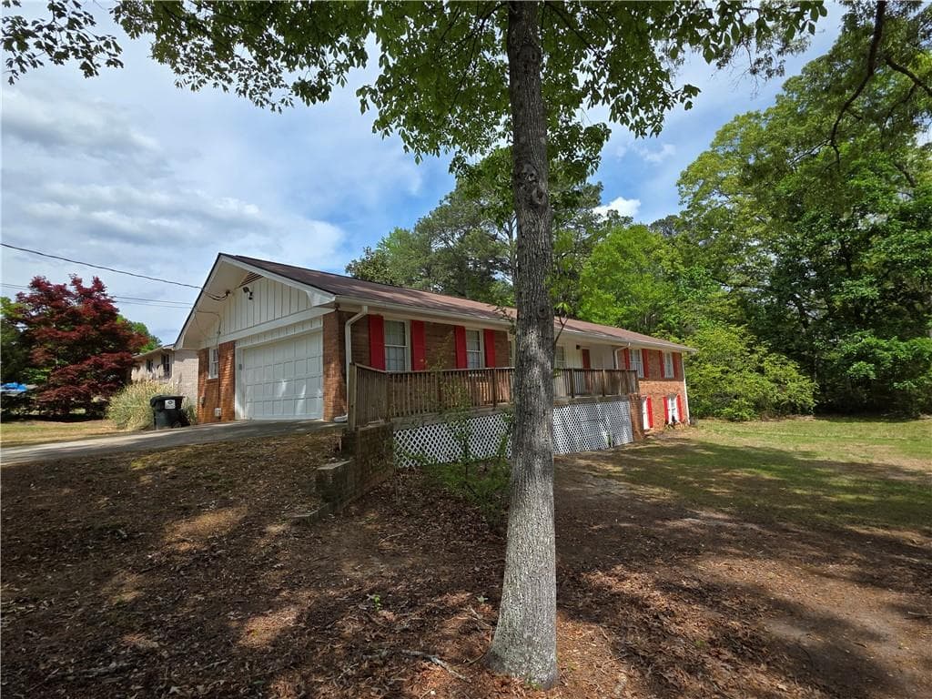 4 bedroom, 2 bathroom, 3,261 sq ft single family residence for sale at 7016 Skyline Drive, Lithia Springs, GA 30122 — photo 4