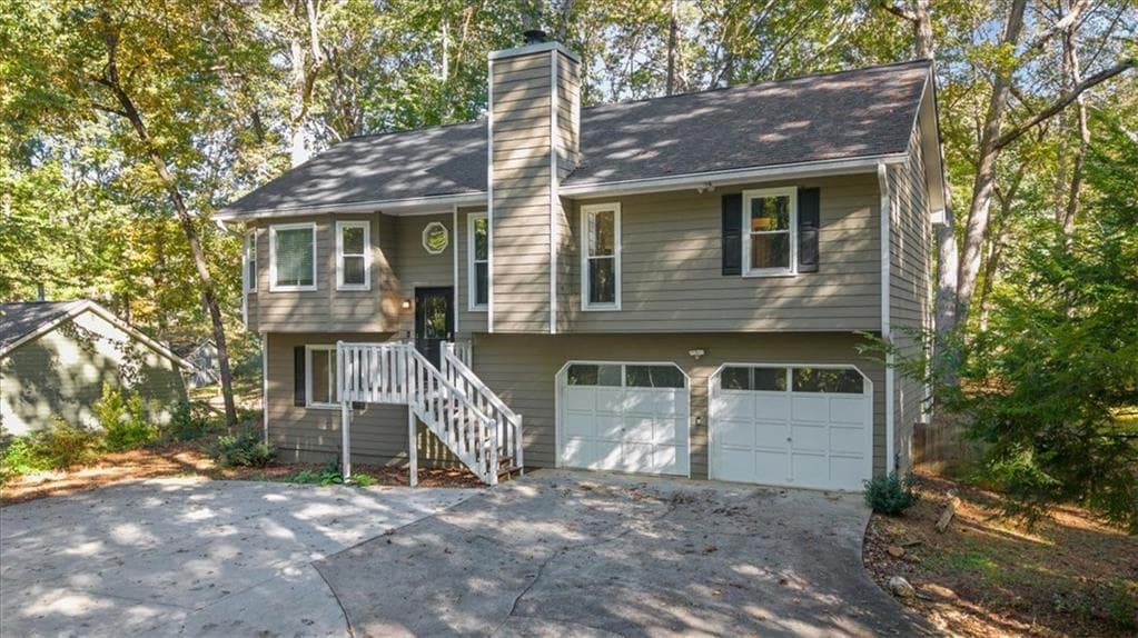 4 bedroom, 3 bathroom, 1,714 sq ft single family residence for sale at 1528 Oakleaf Drive, Auburn, GA 30011 — photo 3