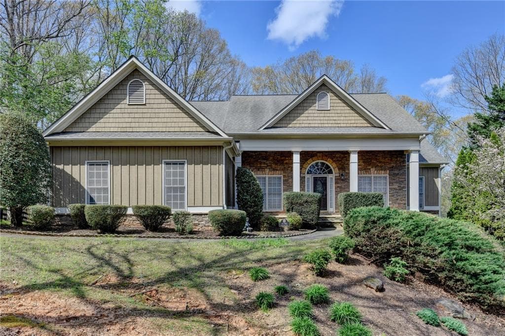 3 bedroom, 2 bathroom, 4,332 sq ft single family residence for sale at 8780 Waterside Drive, Ball Ground, GA 30107 — photo 1 of 46